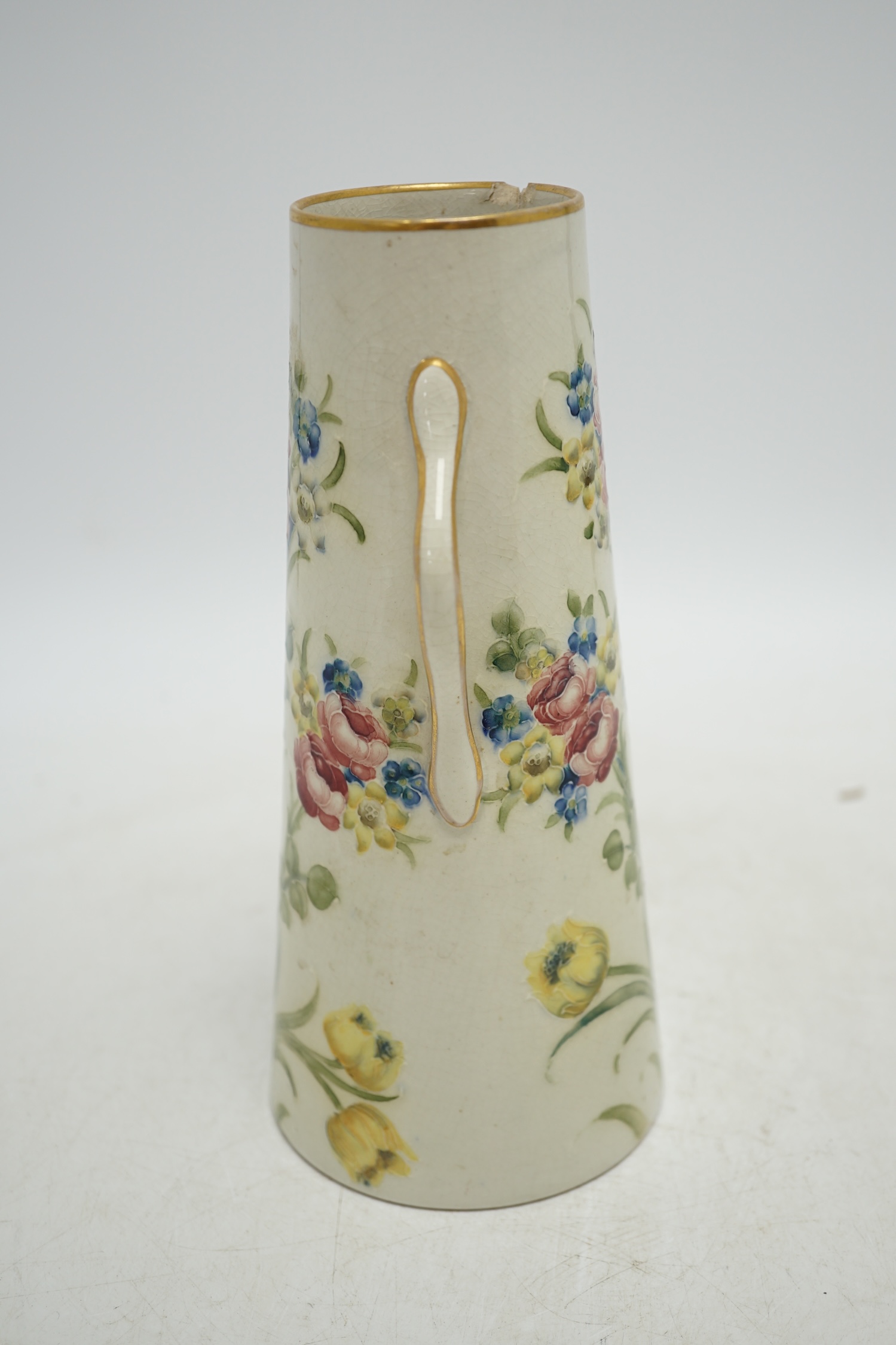 A Moorcroft for McIntyre Florian Ware two handled vase, circa 1905, height 20cm. Condition - large chip and crack to top rim